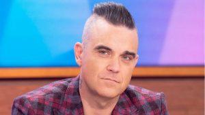 El nou disc de Robbie Williams trigarà una mica més en arribar